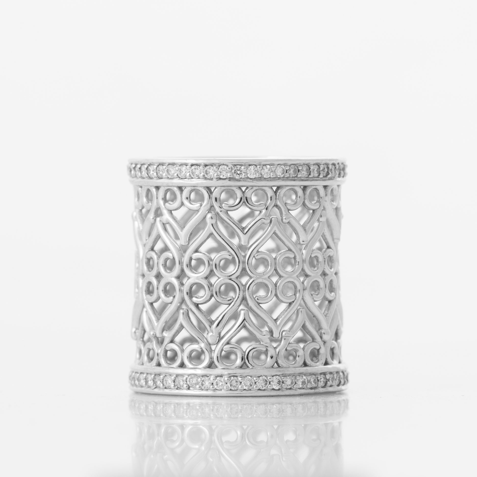 Three separate hoop rings, made of 18k white gold and set with diamonds