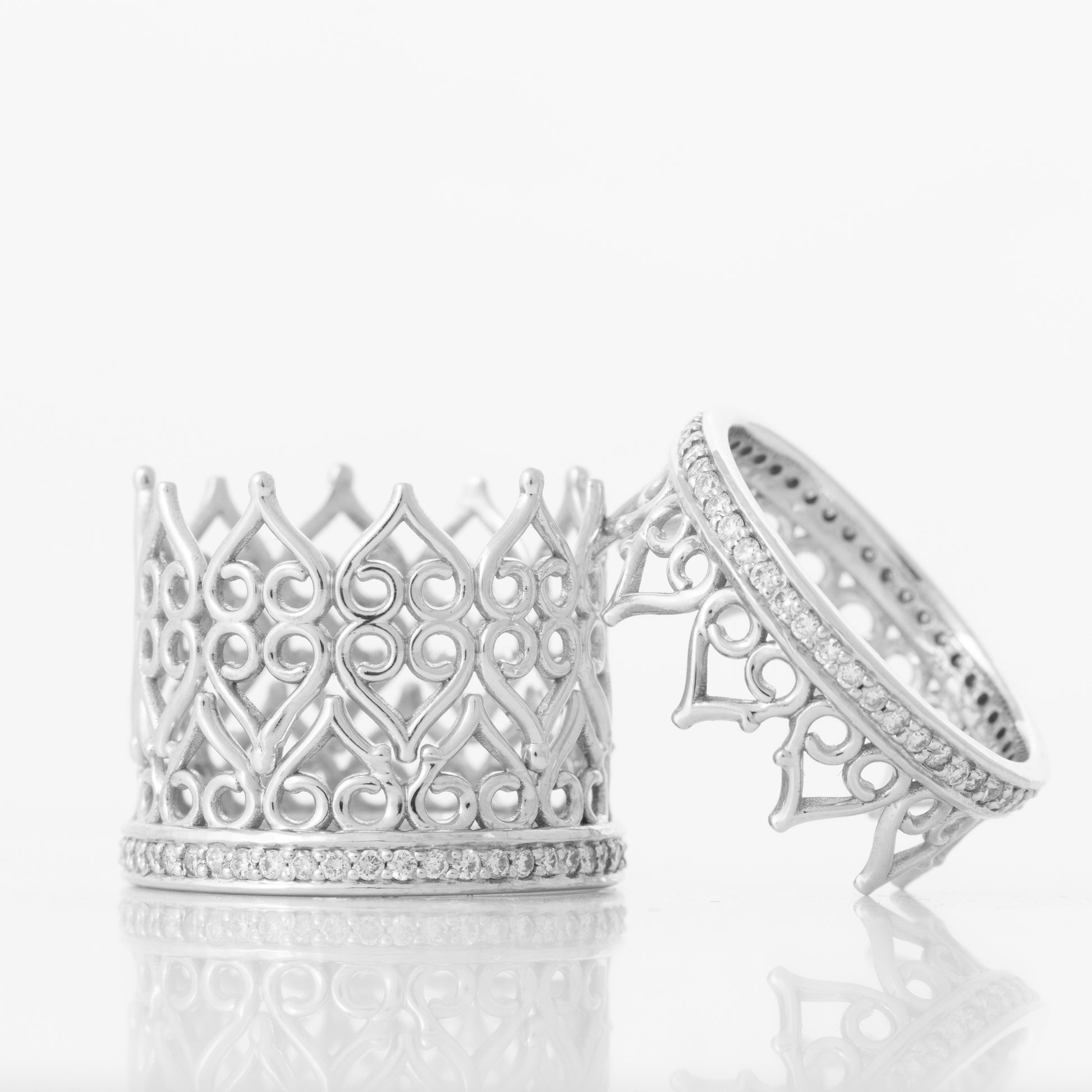 Three separate hoop rings, made of 18k white gold and set with diamonds