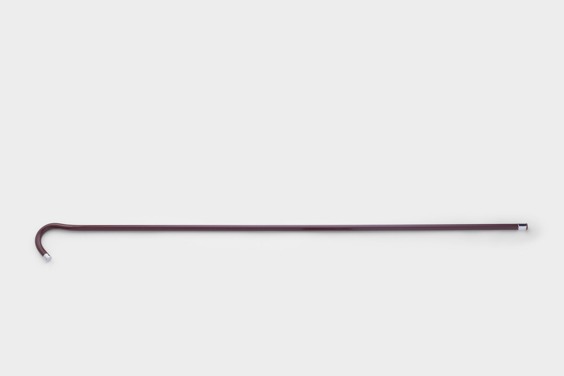 عصا رزن بني غامق مطعمة بالفضة